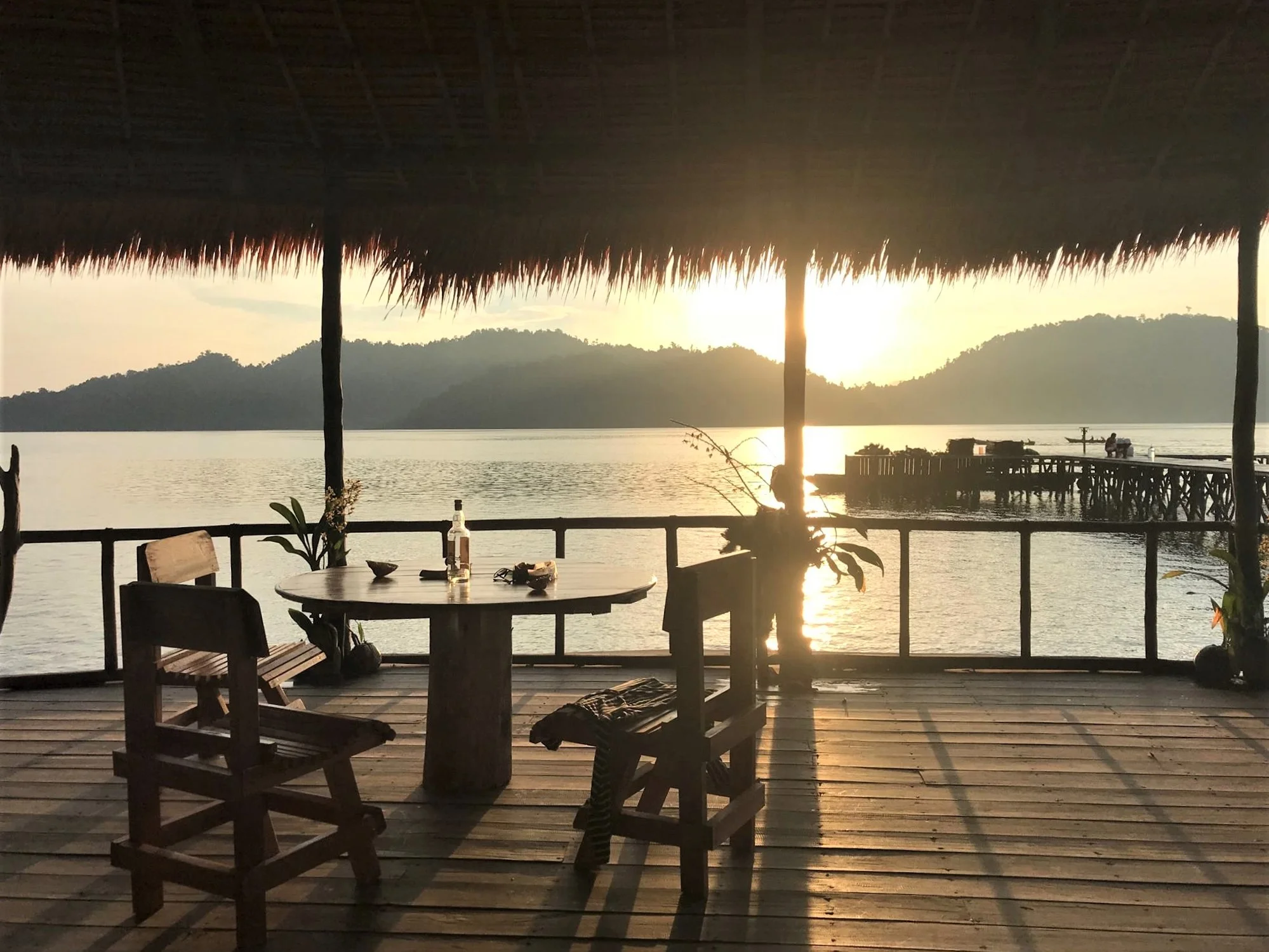 Raja Ampat - Watching the sunset from the balcony at MahaRaja Eco Dive Lodge