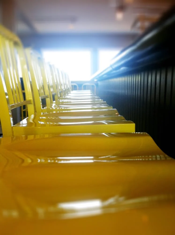 StudioHHH_CK Pearl_Yellow chairs at bar_image by CK Pearl.jpg