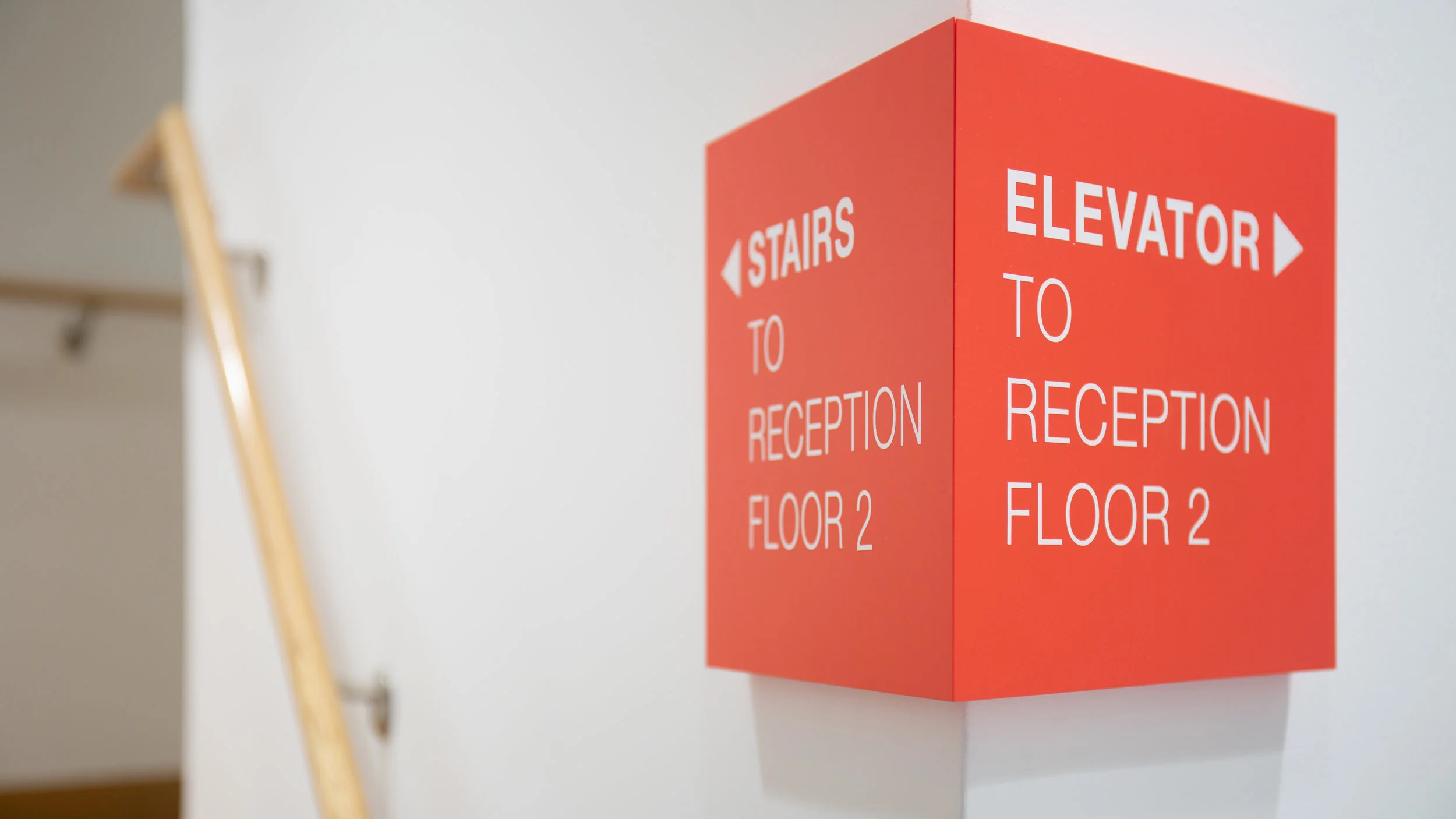 Studio HHH_TRI Environmental Graphics_Directional Sign_Close Up.jpg