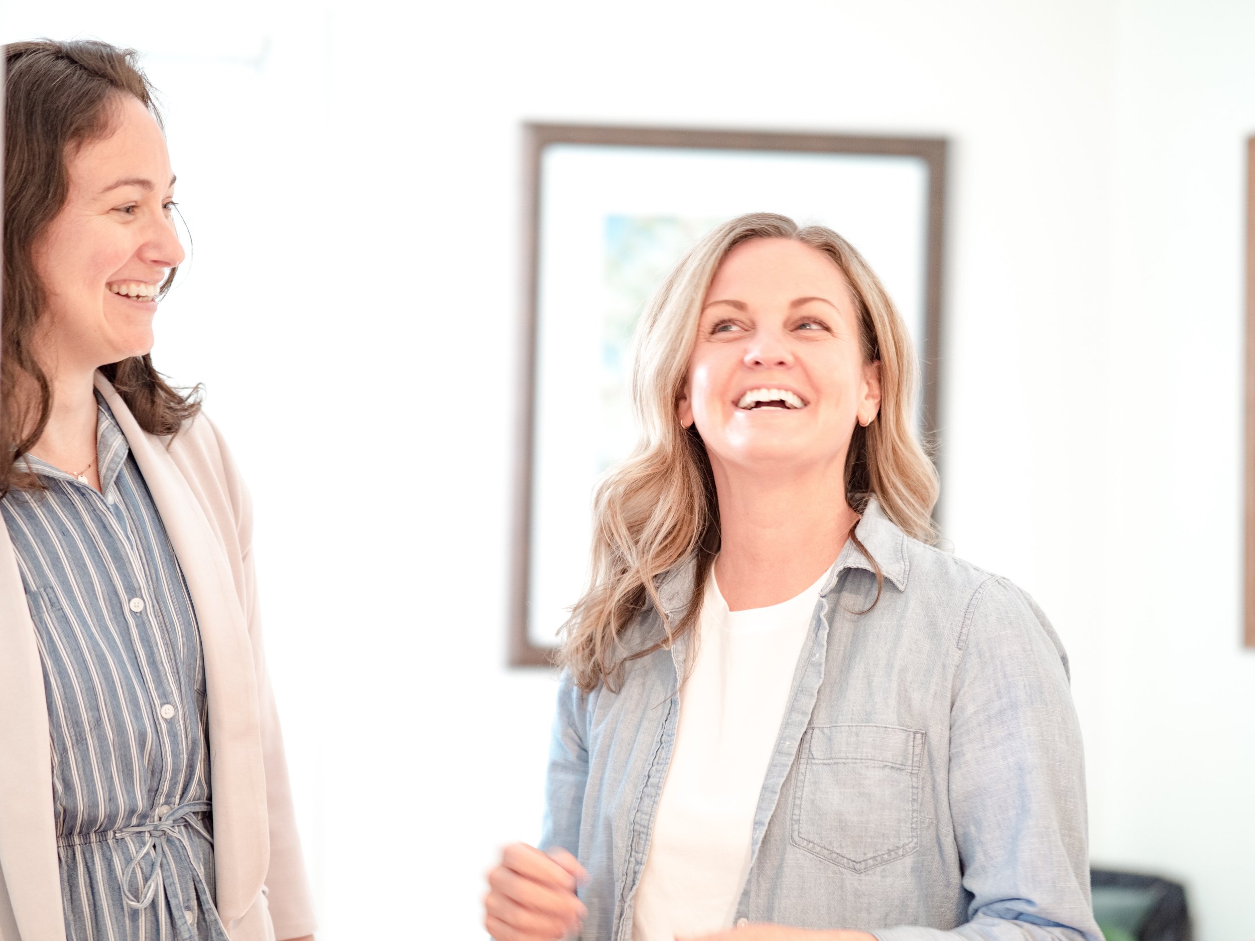 Two women smiling at Balance Acupuncture in Charleston, SC