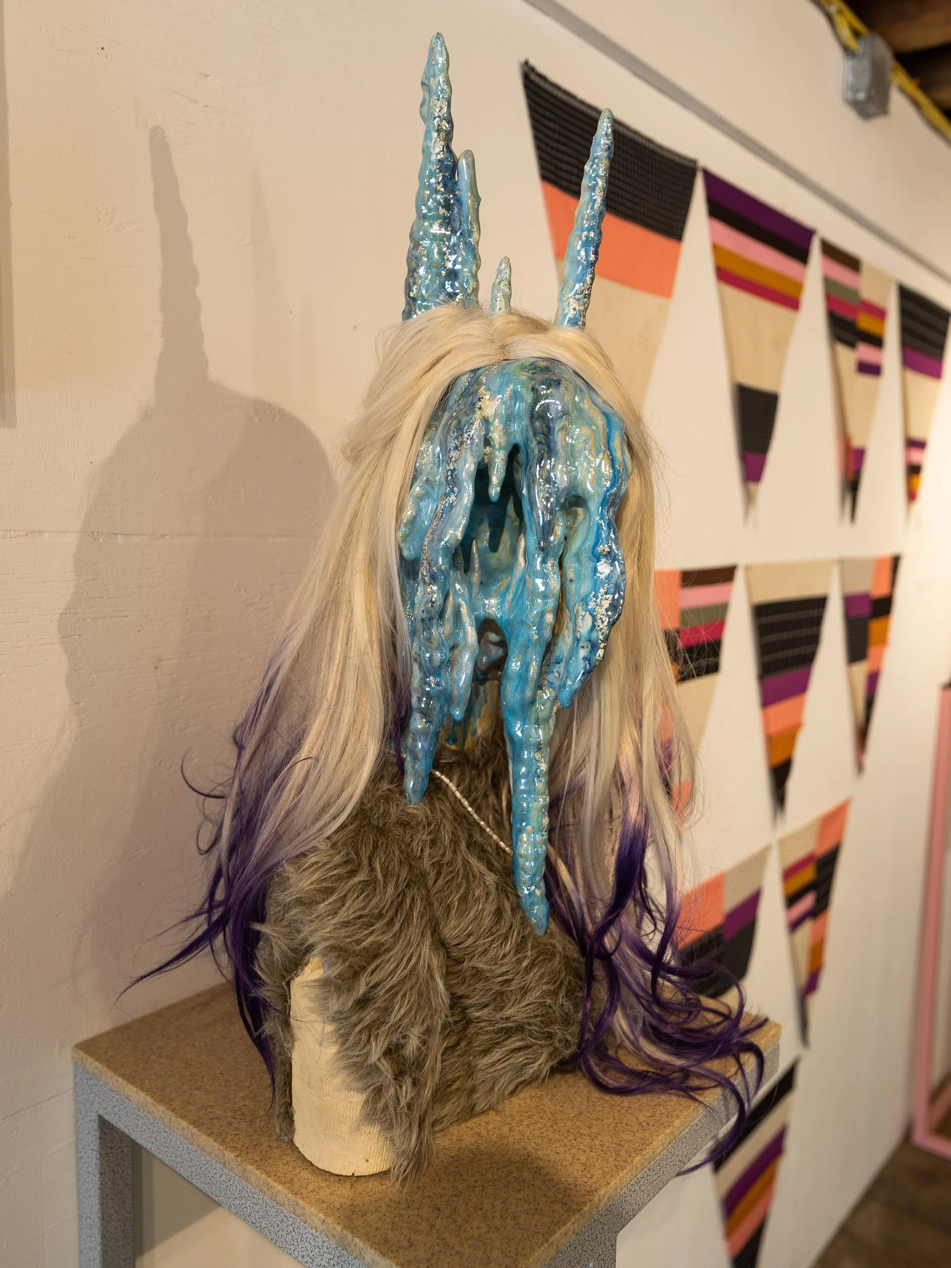 Roxanne Jackson, Bedroom Eyes (2018) Ceramic, glaze, luster, wig, freshwater pearls, faux fur; 16 x 28 x 11 inches