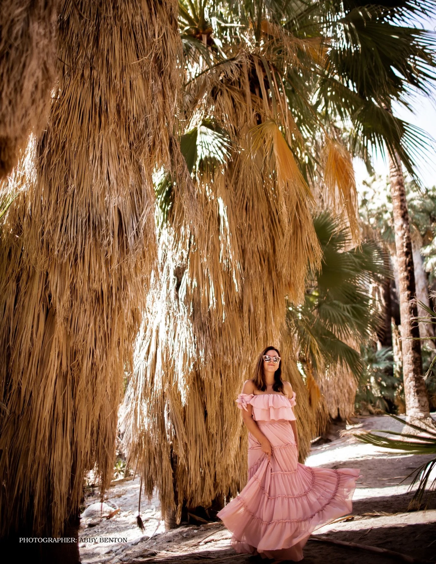 Pops of pink under the palms 🌴 Indian Canyons is a treasure trove for the outdoorsy and a must-visit spot when in Palm Springs 💫