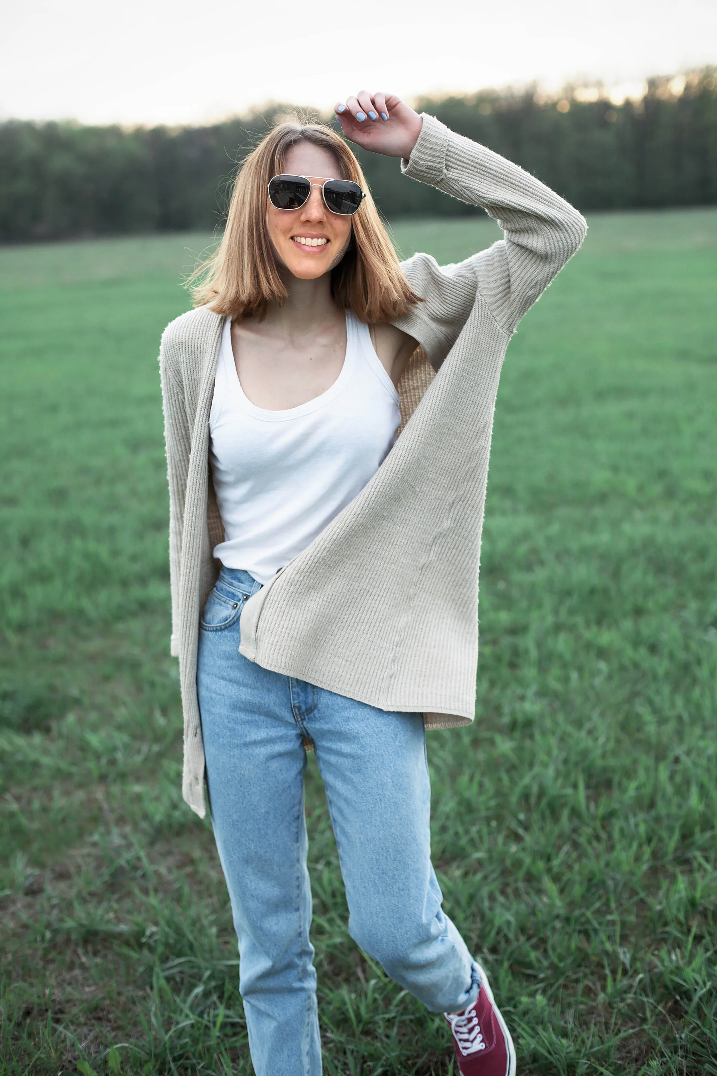 Young woman walking on the lawn