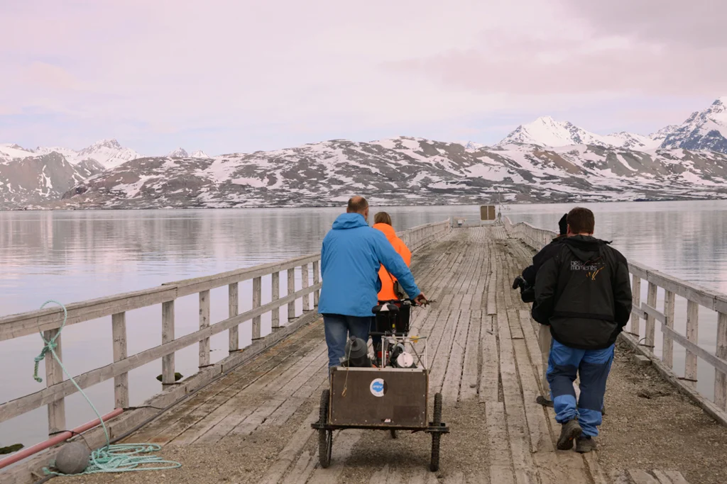 Taking their equipment down to the wharf to collect phytoplankton samples.