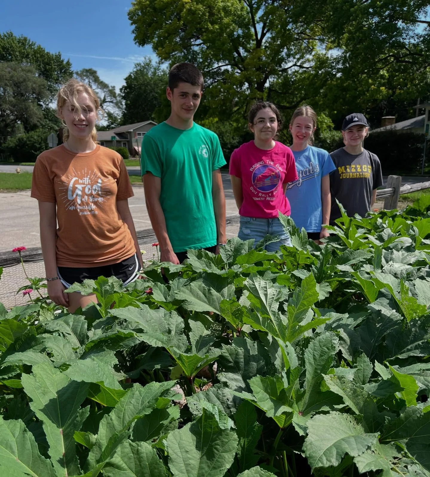 Beautiful morning in the okra patch. Slightly more reasonable temps. So happy to have former Student Gardener Rory (in the middle) volunteering with us today.
I am thinking about a friend of ours in hospice care at KU Med right now. These zinnias a