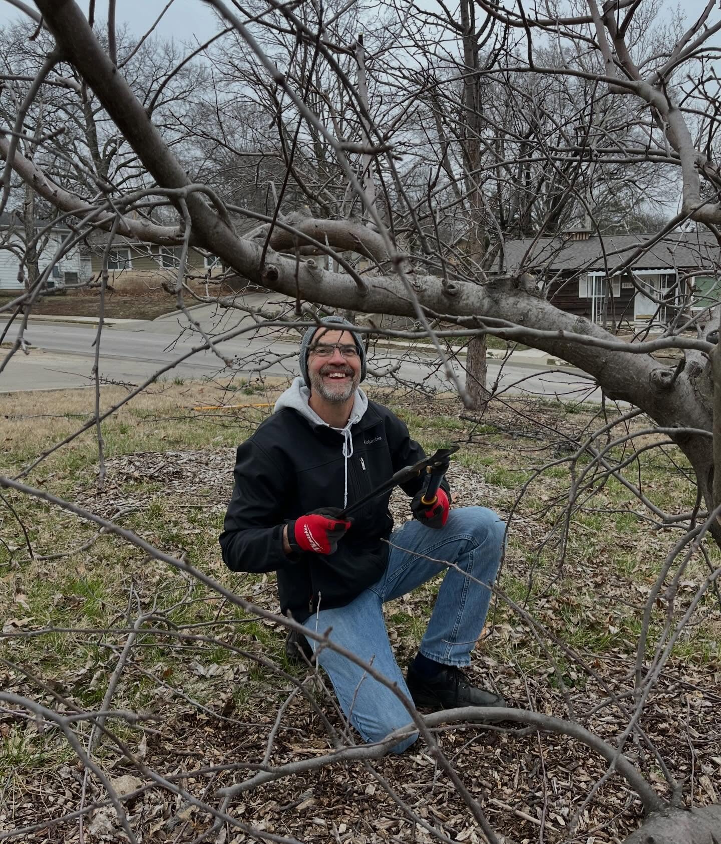 A chilly day, but perfect for pruning the fruit trees in the Growing Food Growing Health orchard. Perry and Jim used their trimming skills while Nancy played pick up sticks.