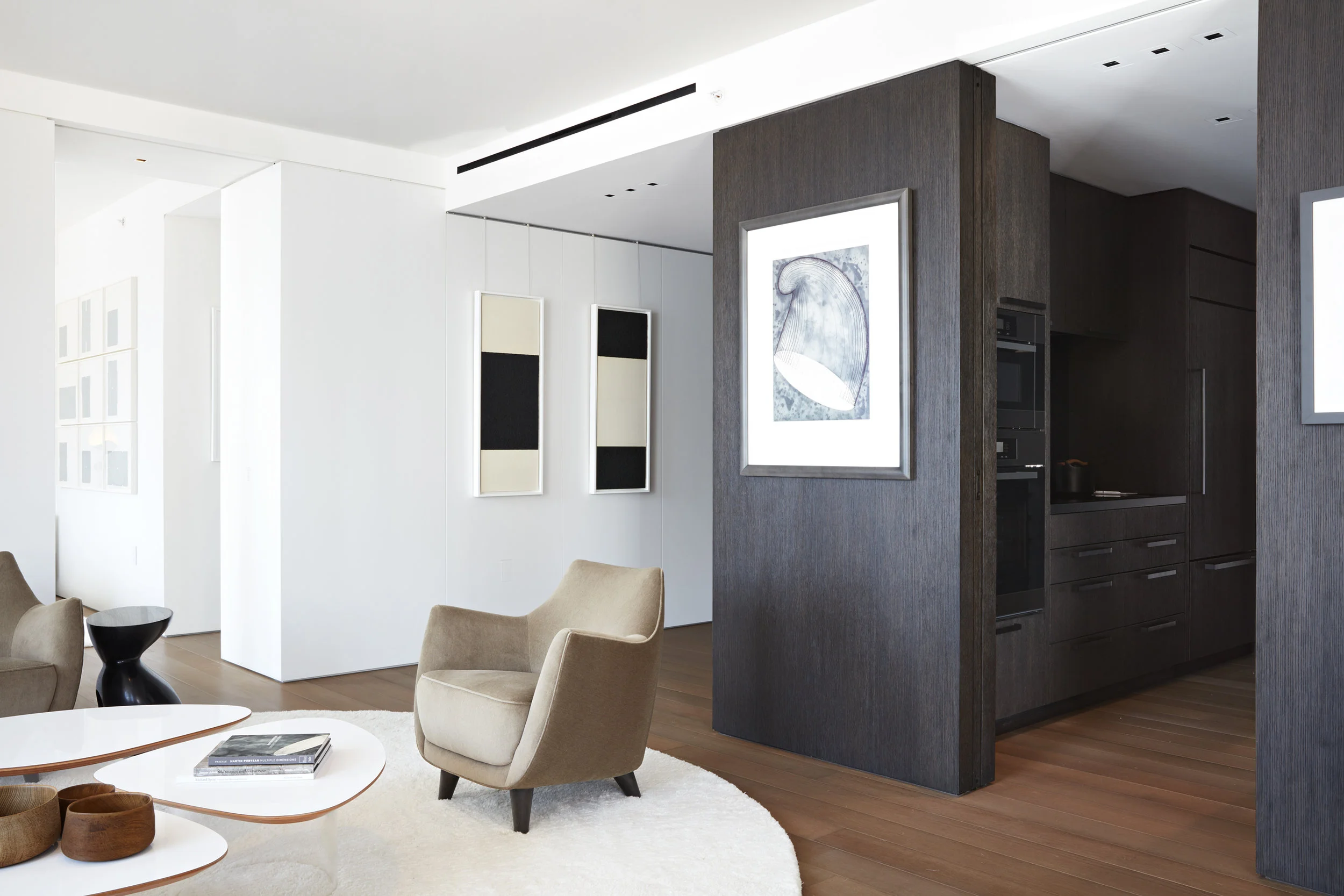 MATERIALS: brushed, stained rift sawn white oak, satin sheen paint, nickel plated steel, white stained white oak, black walnut DESIGNER: Kelly Lasser GENERAL CONTRACTOR: Black Mountain Construction and Development