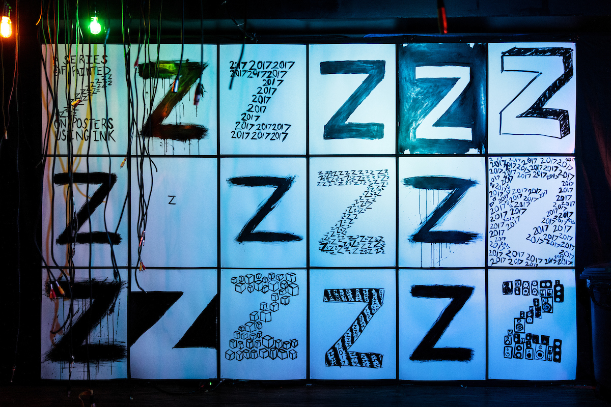 Z (2017) was an immersive multimedia installation presented in conjunction with the release of an album of the same name. Featuring photos by Jeanette D. Moses, as well as a variety of original pieces, the exhibit provided consumers with a specialized listening environment for the bold new sound.