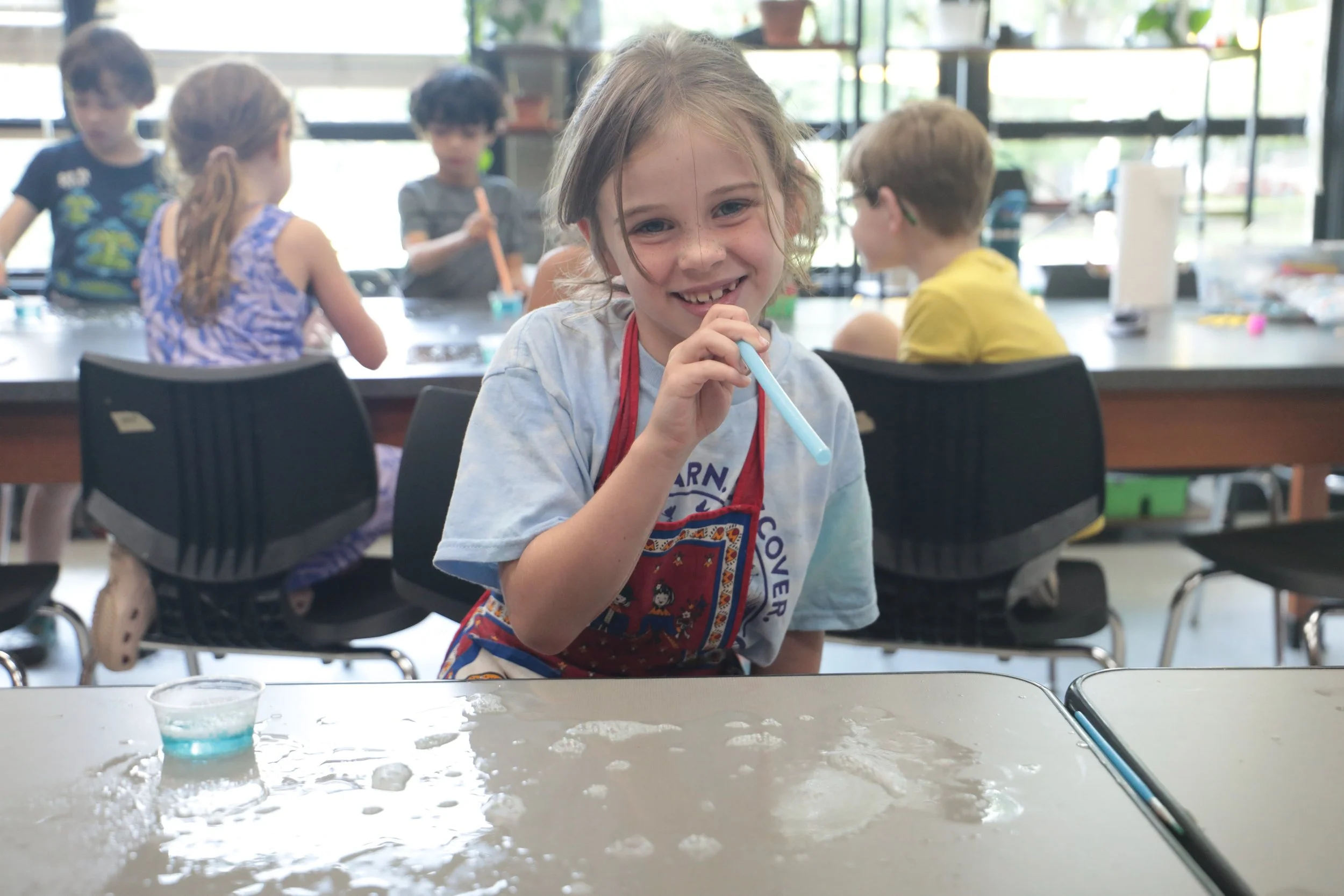 Camp Walden campers enjoying a colorful tie-dye activity