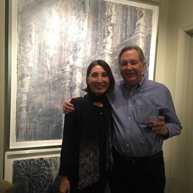 Chizuru Morii Kaplan with Greg Hubert in front of &lsquo;Melodious Paris&rsquo; at our opening for the artist. @hubertgallery#chizurumorii kaplan#paris#architecture#warercolor#decor#interiordesign