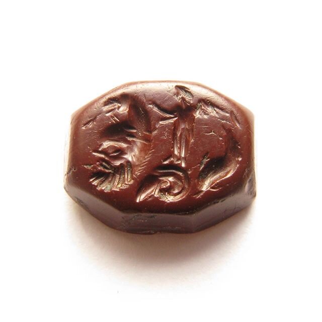 A Roman red jasper intaglio- 3rd century B.C. Engraved with the image of a &bdquo;gryllos&ldquo;representing Eros riding on a sea-horse. The sea-horse composed of a horses head, the head of Silenus , a rams head and a dolphin. Size:15 x 12 mm. Proven
