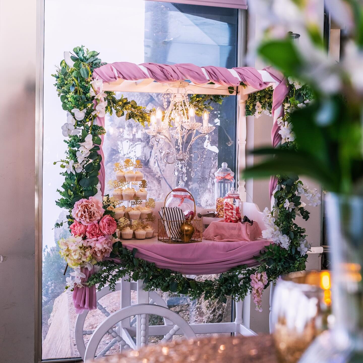 🍭Indulge in Sweet Elegance 🍭
Our exquisite sweet cart is here to add a touch of magic to your event, adorned with delicate florals and a glistening chandelier and complete with all the sweet treats one could wish for! It can be customised to perfec
