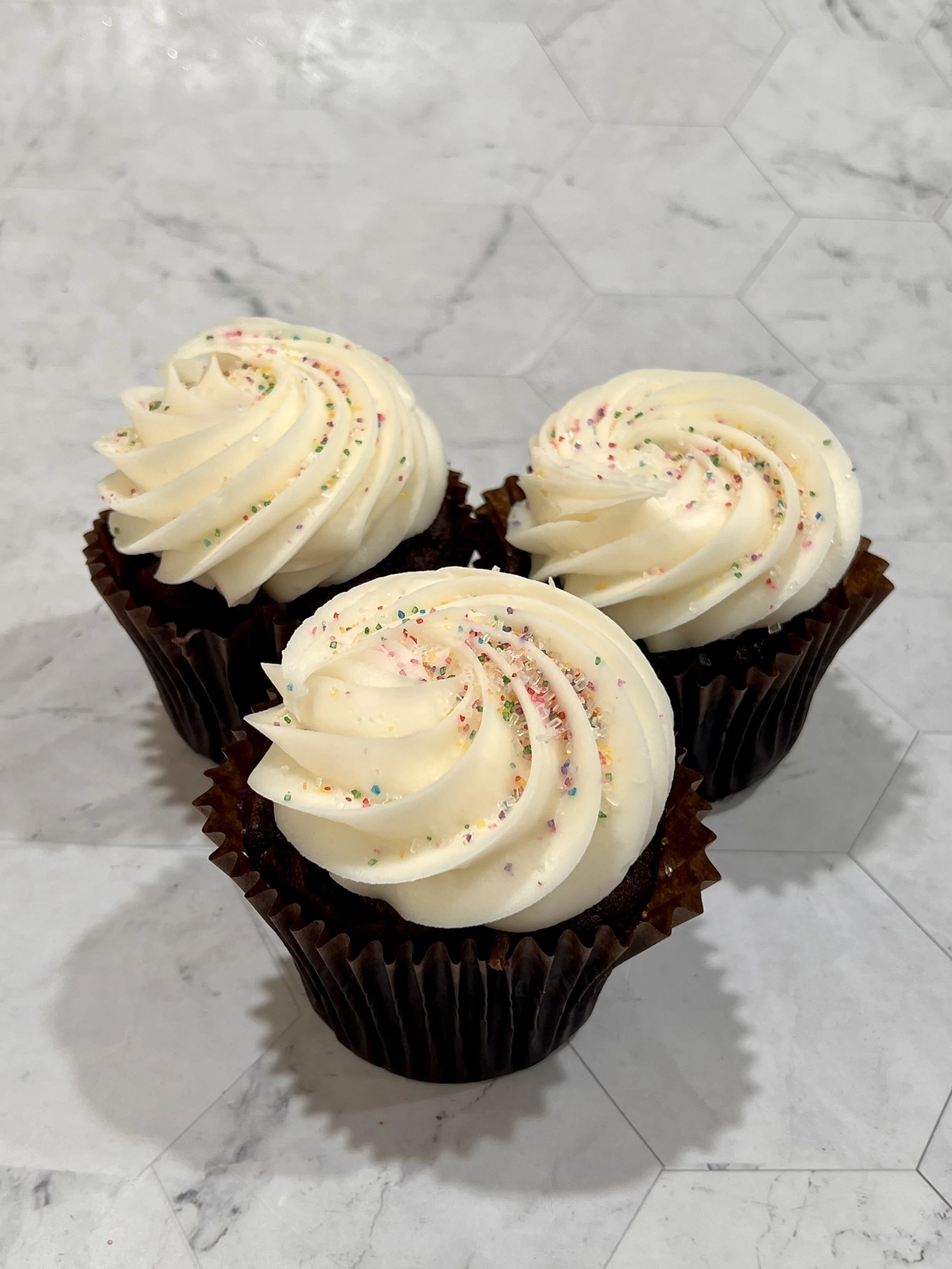 SIMPLY CHOCOLATE - chocolate cake, vanilla buttercream (color changes seasonally)