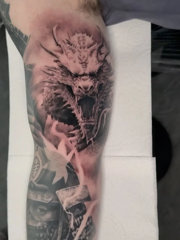 D R A G O N 
-
Nearly there with @finleysmith10 sleeve. Just bits to do on the outer arm to conclude it.
-
Done at @thinkstudio_bristol 
-
#dragon #japan #tattoo #blackandgreytattoo #samurai