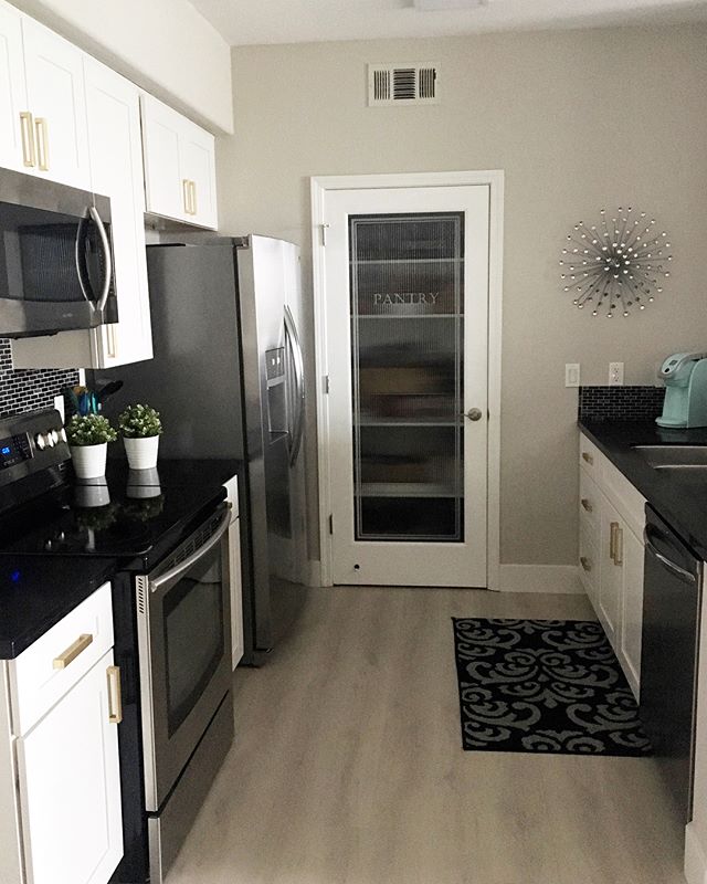 After and before kitchen pix! Love the Agreeable Gray paint I chose..it&rsquo;s a good neutral gray. Happy with the vinyl plank floors too- they are virtually indestructible! #designlife #organized #kitchendesign #remodel #kitchen #calistyle #condoli