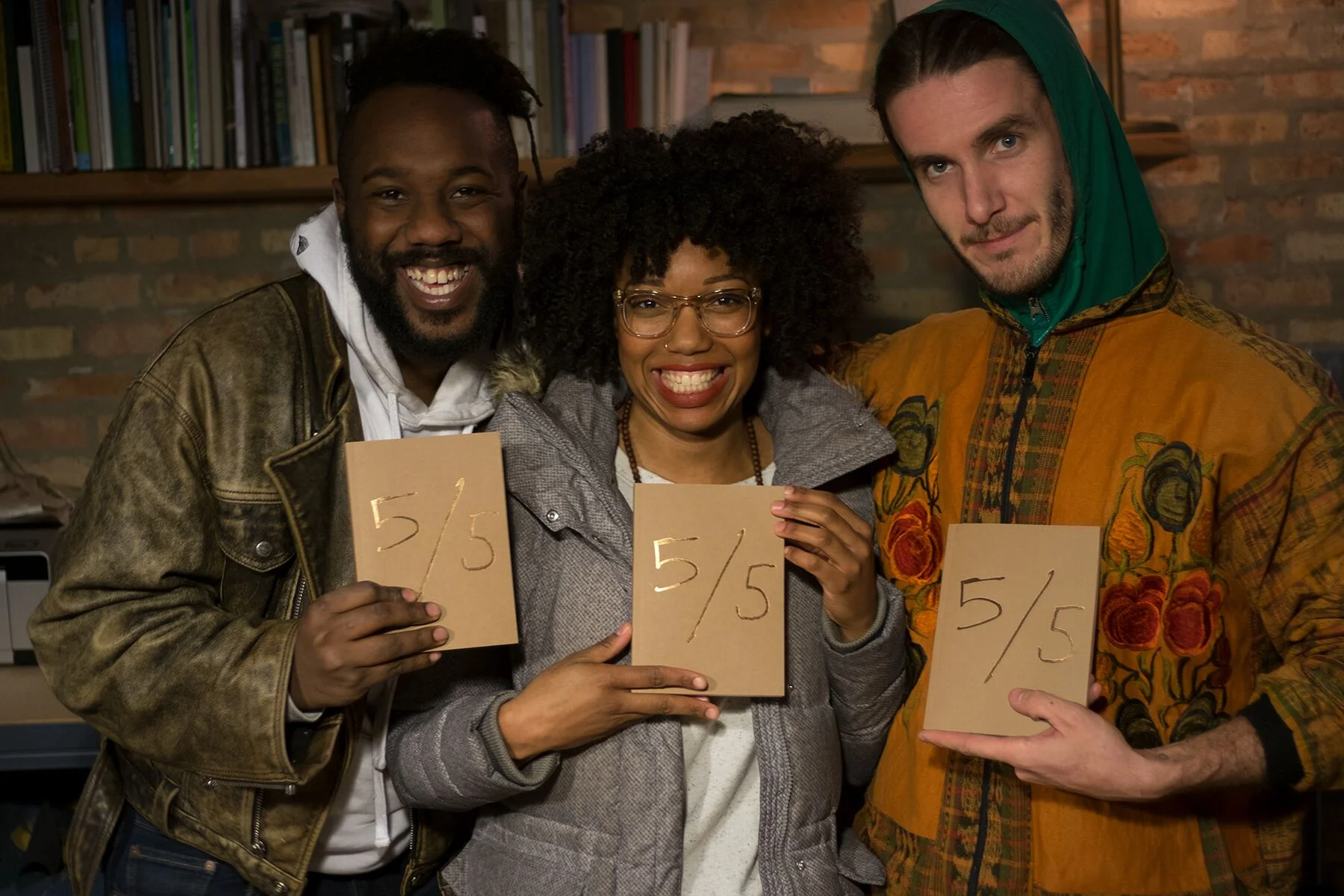  Holding our book  Five Fifths  for the first time. 