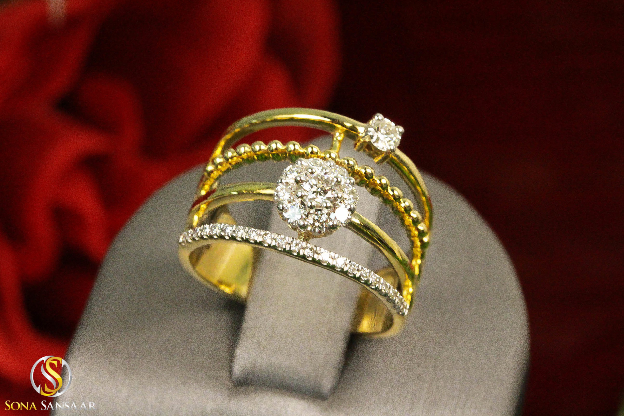 18kt Fancy Four-Row Diamond Ring