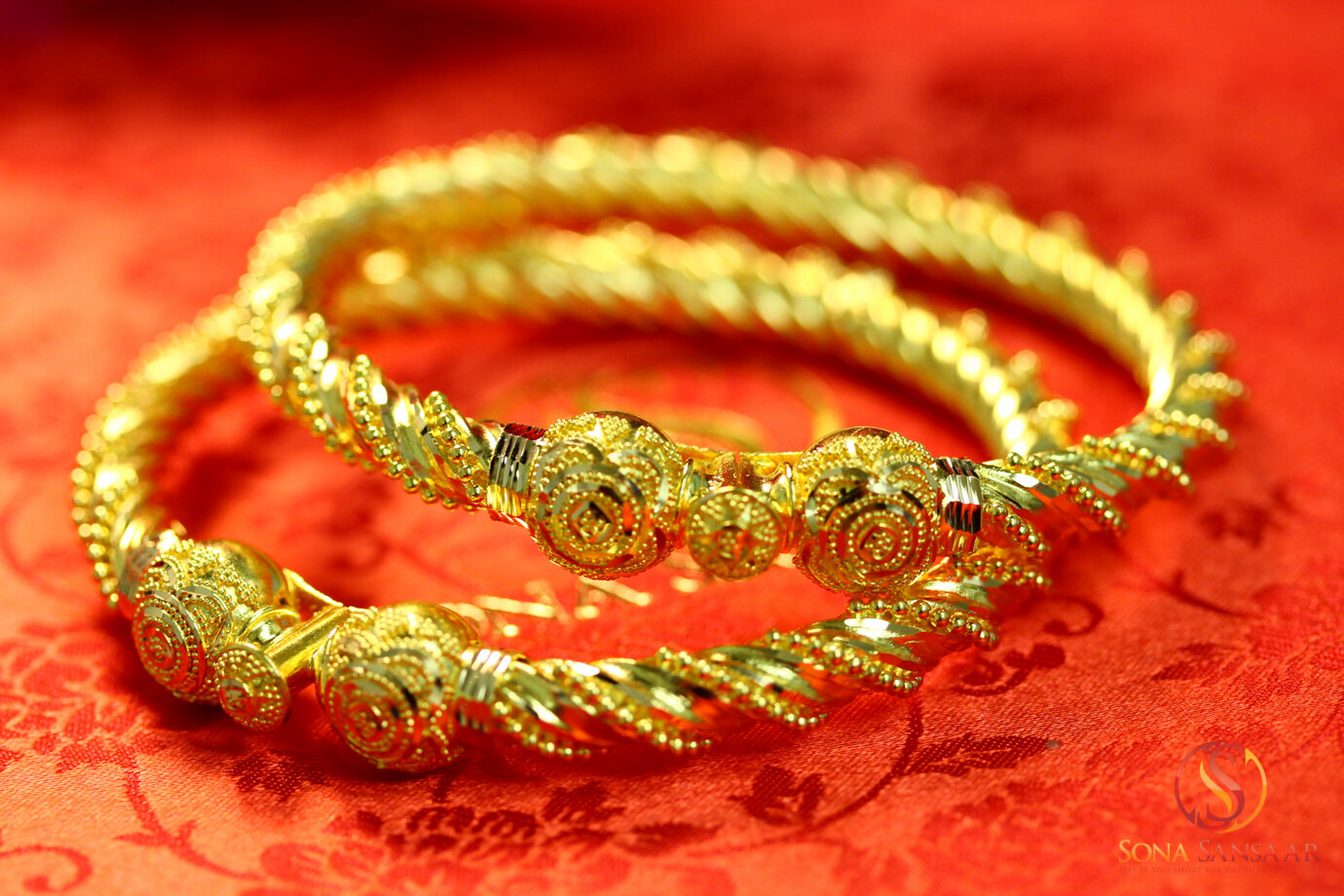 Pair of  Gold Twisted Rawa Design Bangles 