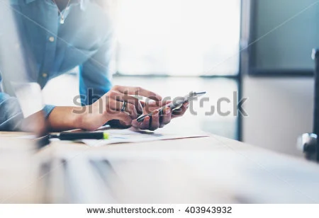 stock-photo-business-process-photo-account-manager-using-mobile-phone-typing-contemporary-smartphone-screen-403943932.jpg