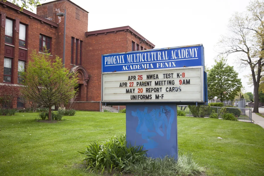 The sign outside Phoenix Multicultural Academy on Lane Street shows recently updated dates of importance. The school will close permanently at the end of the school year.
