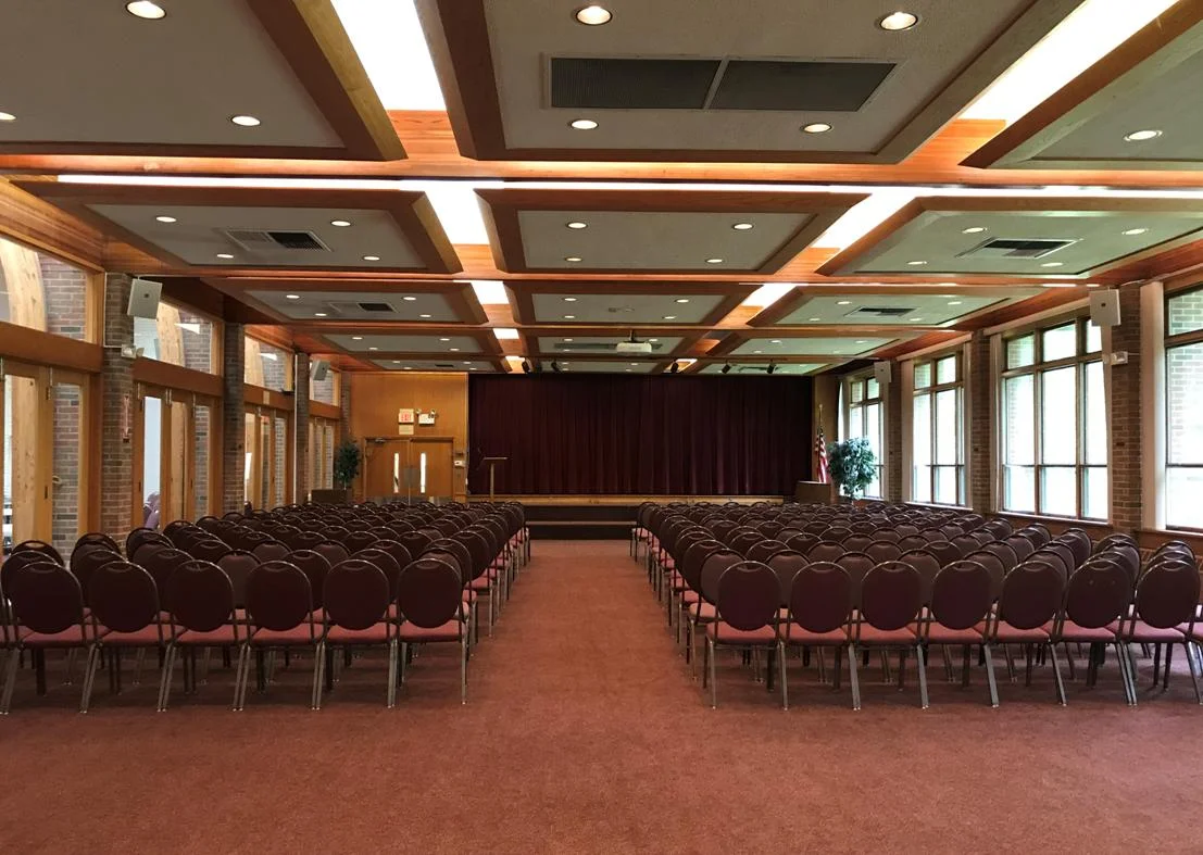 Church Saddler Hall w.chairs and stage.jpg
