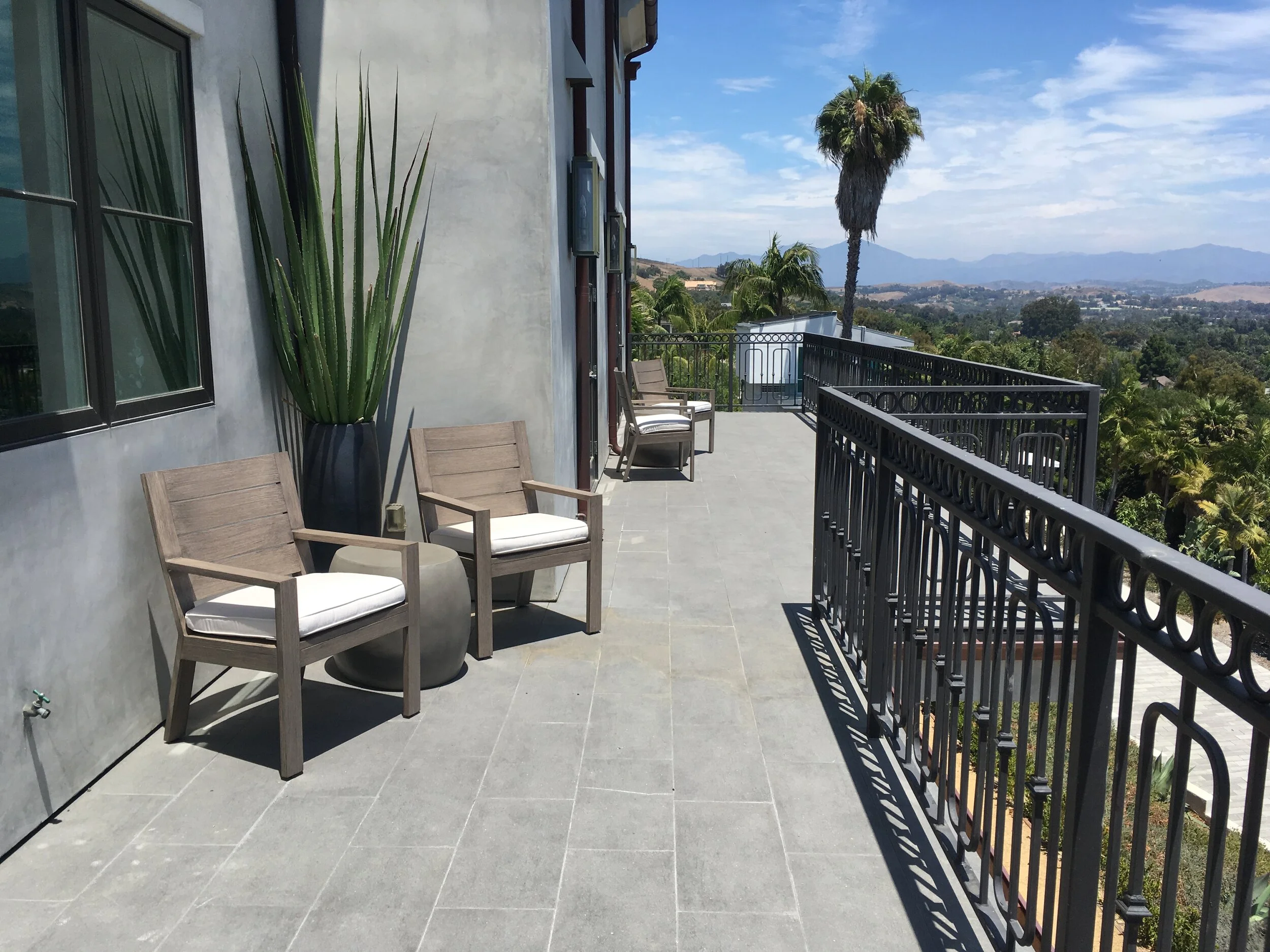 Balcony chairs with tables.JPG