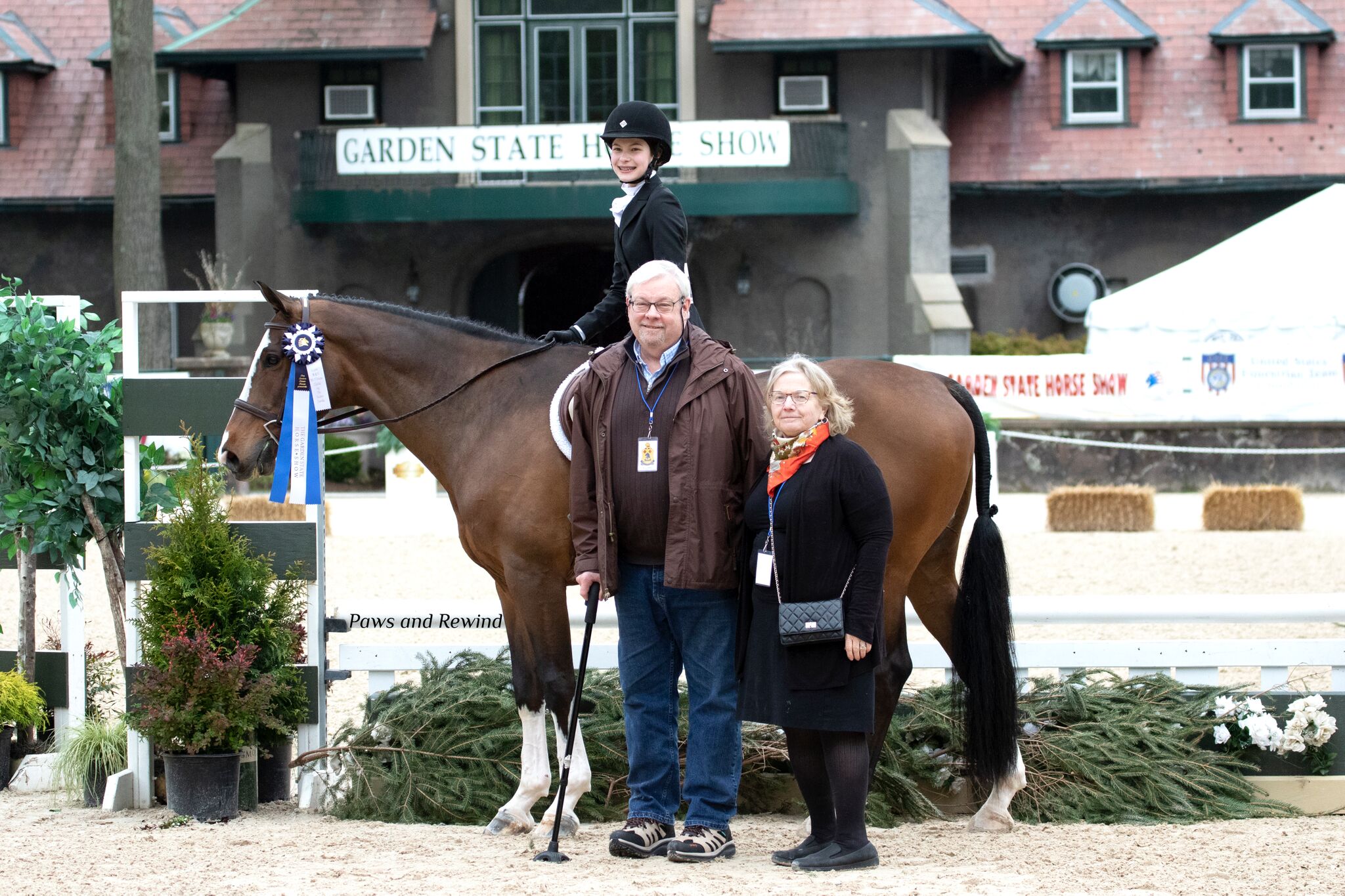 Callia Bergad with sponsors Kim and John Walker. Photo by Paws and Rewind