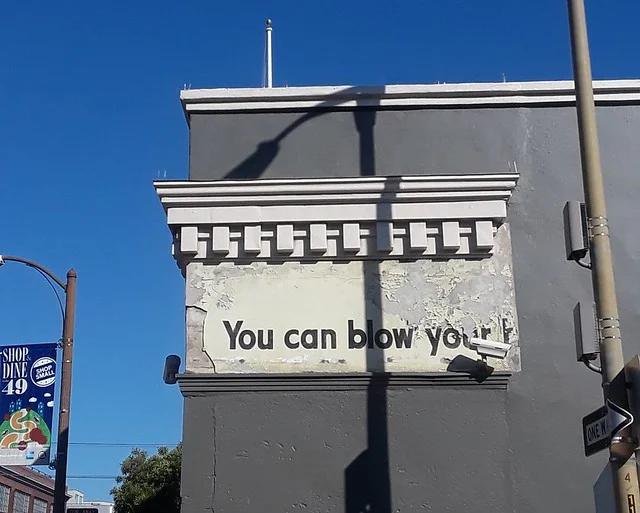 "You can blow your h..." Partial ad on 430 3rd, as seen from Stillman Street. My guess is that it's from this Kleenex ad, circa late 40's/early 50's.