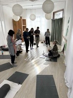 YTT Students taking notes 2024 - IMG_5608 Small.jpeg