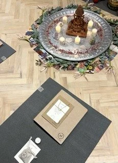 YTT Ganeshe and manual on mat 2024 IMG_5523 Small.jpeg