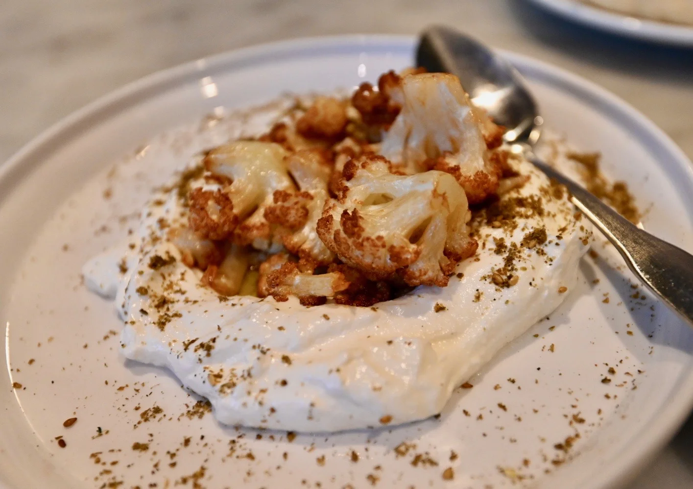 Roasted cauliflower, labneh , dusted with za’atar.