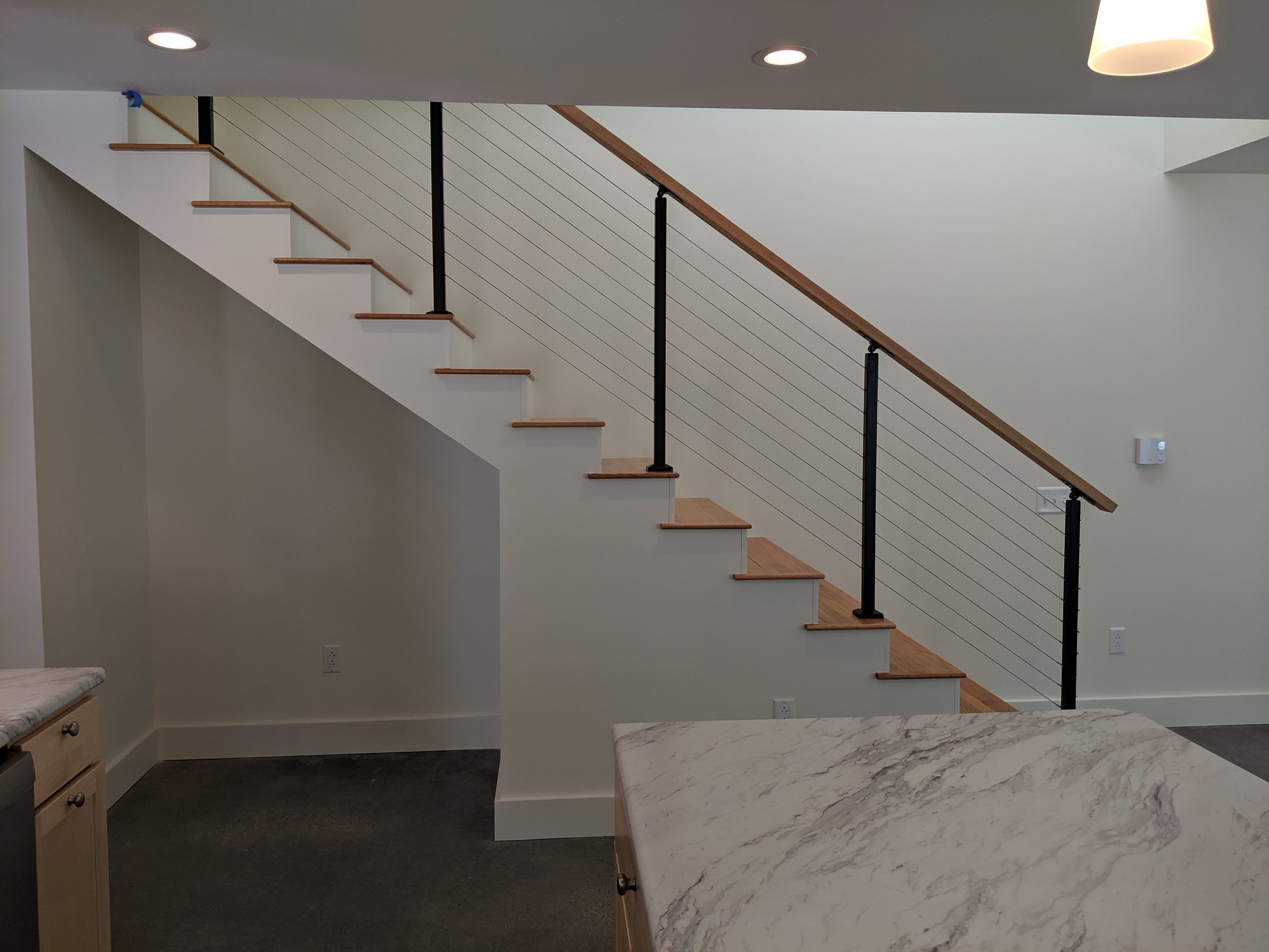 Staircase with Custom Cable Rails + Oak Treads