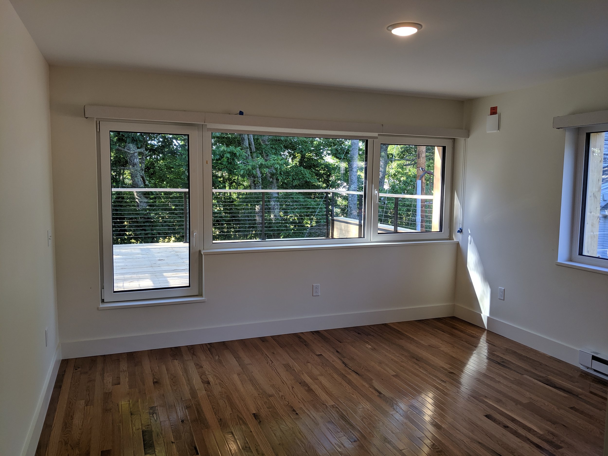 Upstairs Bedroom with 2nd story custom cedar rooftop balcony