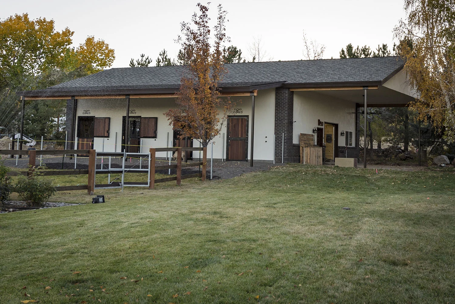 Roof overhangs provide cooling shade for horses.