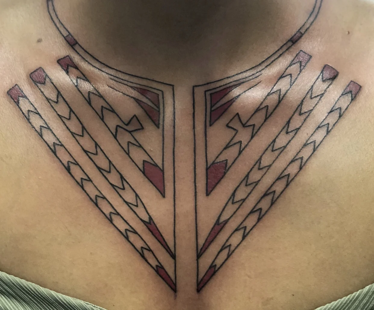 A custom chest piece designed by Toby Sicks that was made to symbolize spirituality and ceremony for a customer undergoing a healing journey. According to Sicks, the piece symbolizes the customer’s cultural identity of the Kanyen’kehà:ka Mohawk nation. Learn more about this custom tattoo in this video by APTN. (Photo courtesy of Toby Sicks via Instagram)