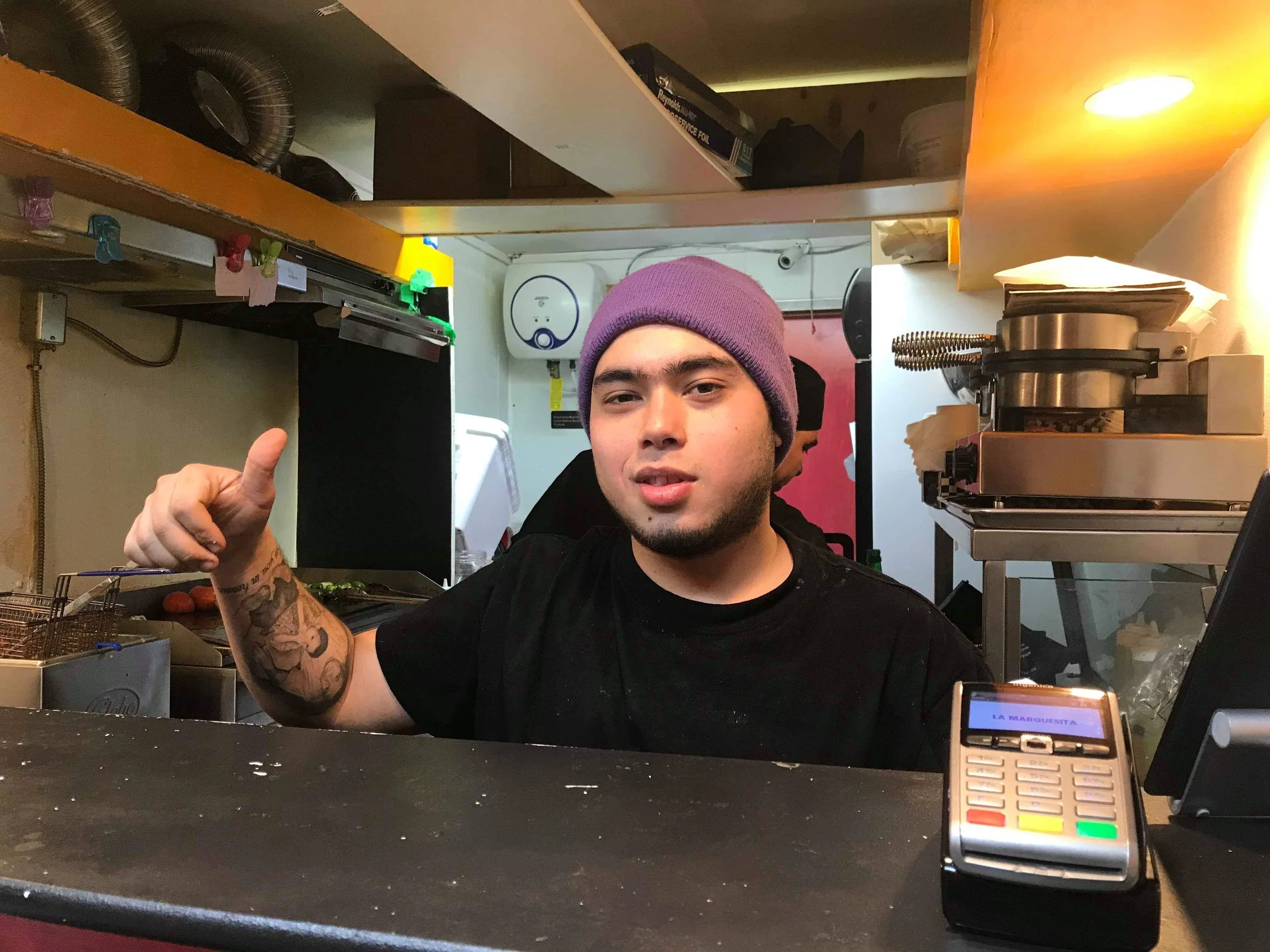 Pablo Morales greeting customers at La Marquesita. La Marquesita hopes to become a franchise and open more stores downtown. (CanCulture/Keisha Balatbat)