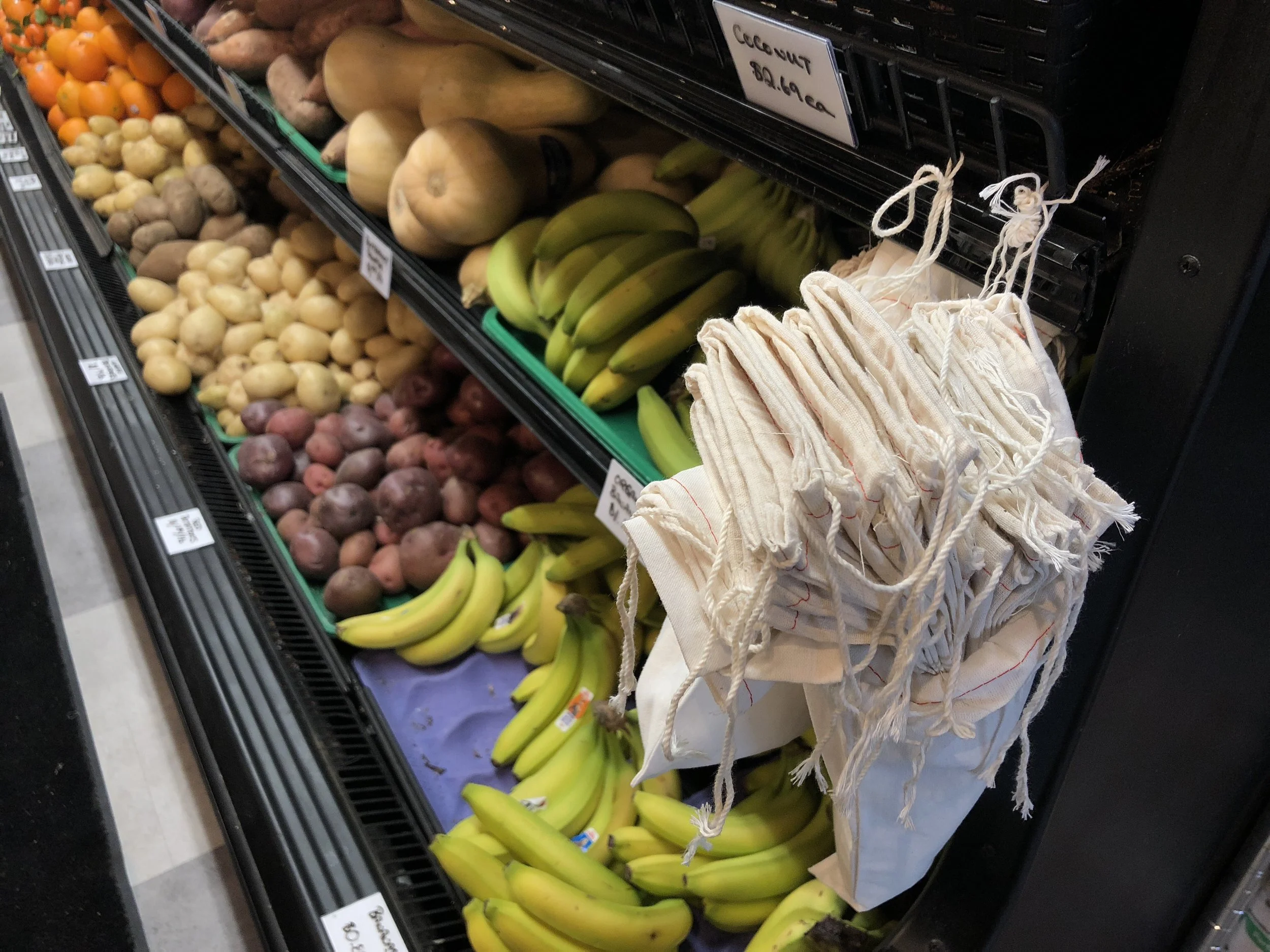 Unboxed Market offers cloth bags for two dollars each for produce in the store, in order to eliminate the use of harmful plastic bags. (CanCulture/Sophie Chong)