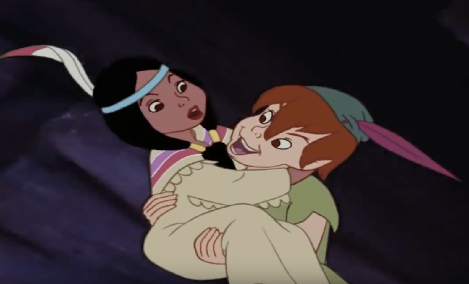 A scene from Peter Pan where a young Indigenous woman, Tiger Lily, is held captive by Captain Hook and rescued by Peter Pan. (Via YouTube )