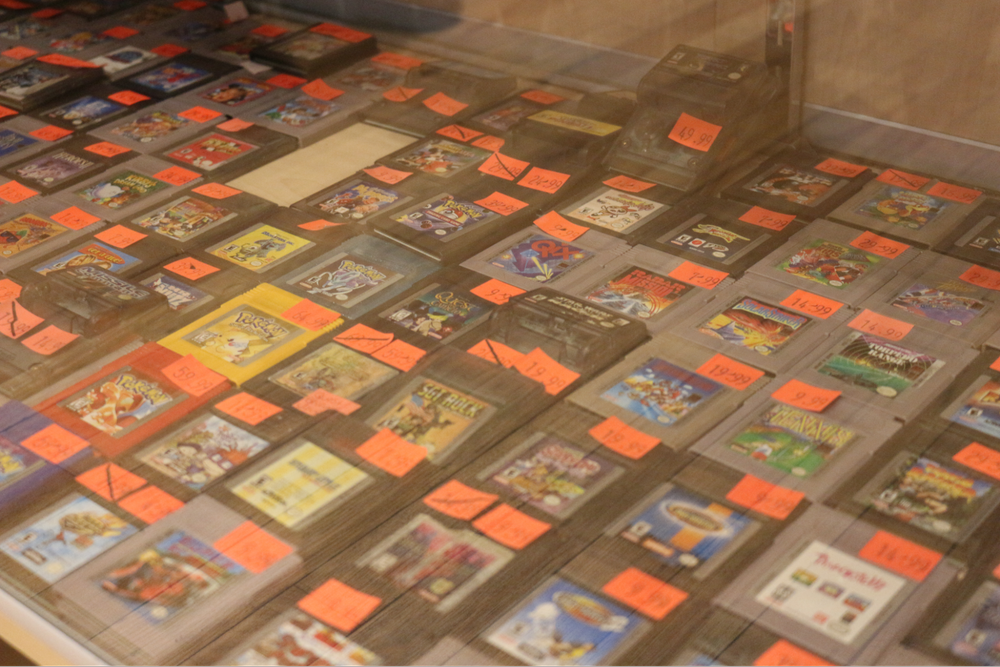  Video game cards lined up in rows showing their covers. 