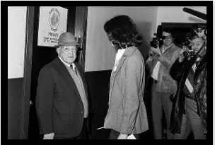 Gordon Robertson, locker room guard, stops Robin Herman from entering the Chicago Black Hawks locker room (January 1975).