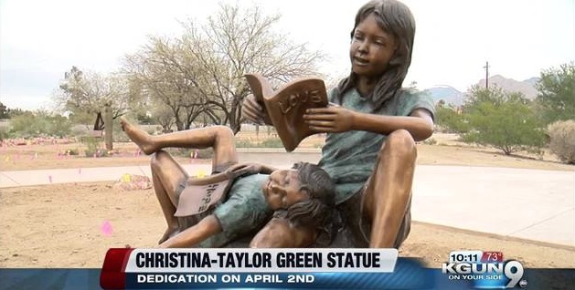 Christina-Taylor Green watched over her younger brother, reading to him as a big sister does. in her memory, this sculpture was dedicated and stands in sad remembrance of this girl who was born on 9/11, who died from when bullets aimed at Representative Gabby Giffords hit her. That was on a morning when Christina, who was nine year old, awakened feeling excited that her neighbor was taking her to meet a woman she admired in politics.