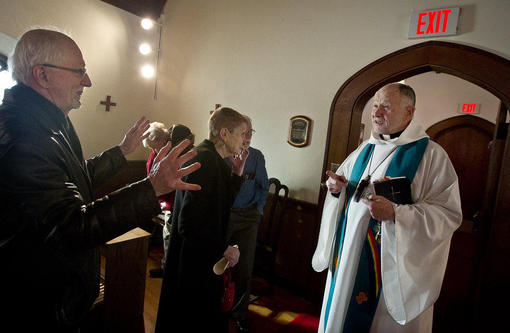  NORTH LAKE, WI — JANUARY 18, 2015: Reverend David Couper delivers the homily during during mass at St. Peter’s Episcopal Church, Sunday, January 18, 2015. 