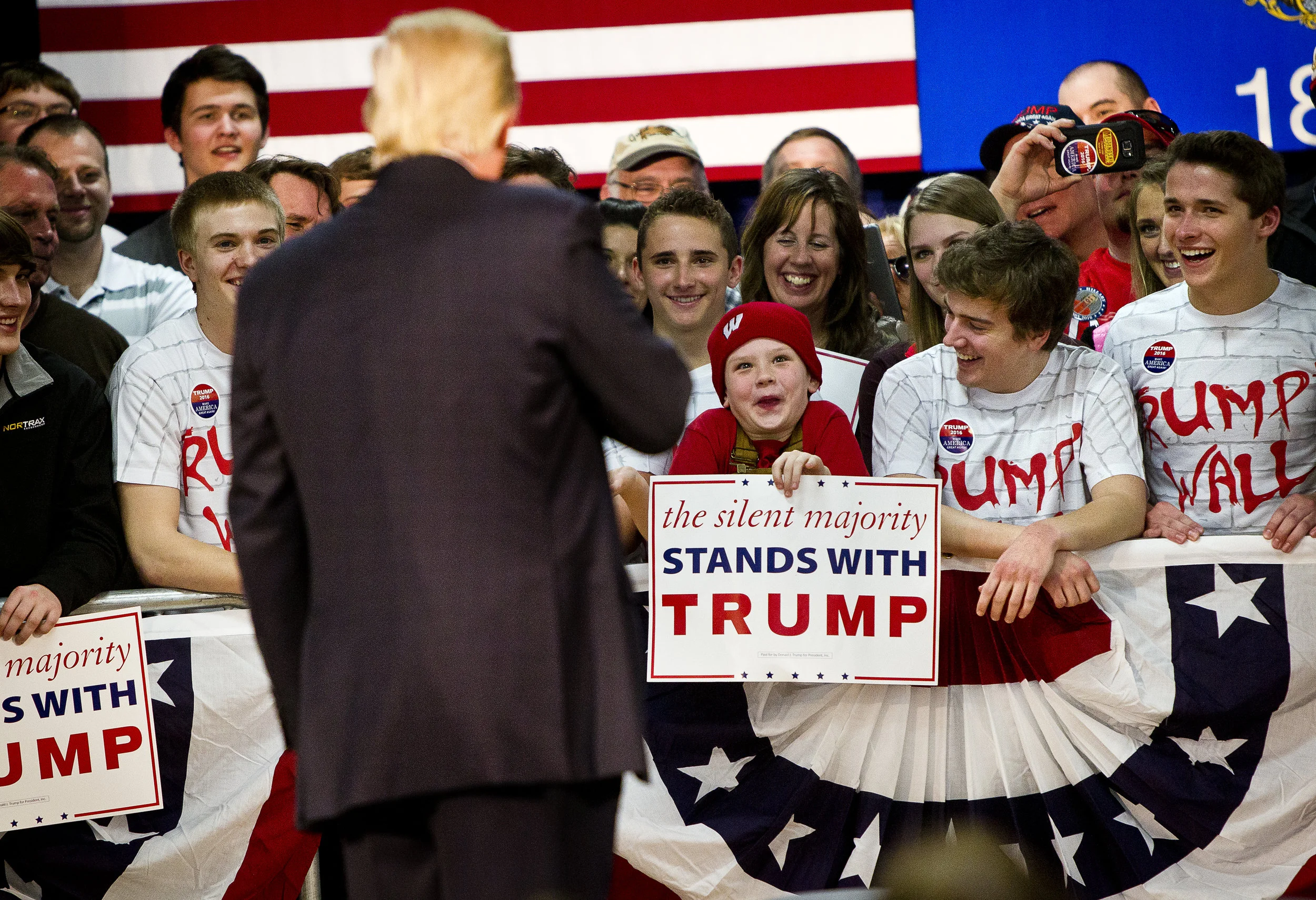  young Donald Trump supporter reacts to being talked about by the Republican U.S. presidential candidate at a campaign town hall event in Wausau, Wisconsin April 2, 2016. REUTERS/Ben Brewer