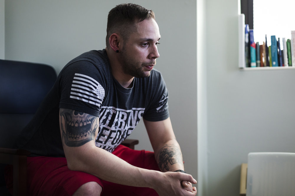  Army veteran Kristopher Heimerl, 30, sits for a portrait at the Tomah VA Facility in Tomah, Wisconsin, Monday, April 23, 2018. Heimerl is currently undergoing treatment for a Traumatic Brain Injury (TBI) as well as combat Post-Traumatic Stress Disor