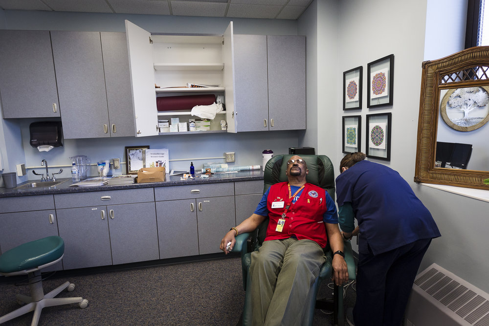  Marine Corps veteran Frank Smith, 62, receives a battlefield acupuncture treatment from Dr. Katherine Pica at the Tomah VA Facility in Tomah, Wisconsin, Monday, April 23, 2018. Smith suffers from chronic lower back pain and says that he feels a grea