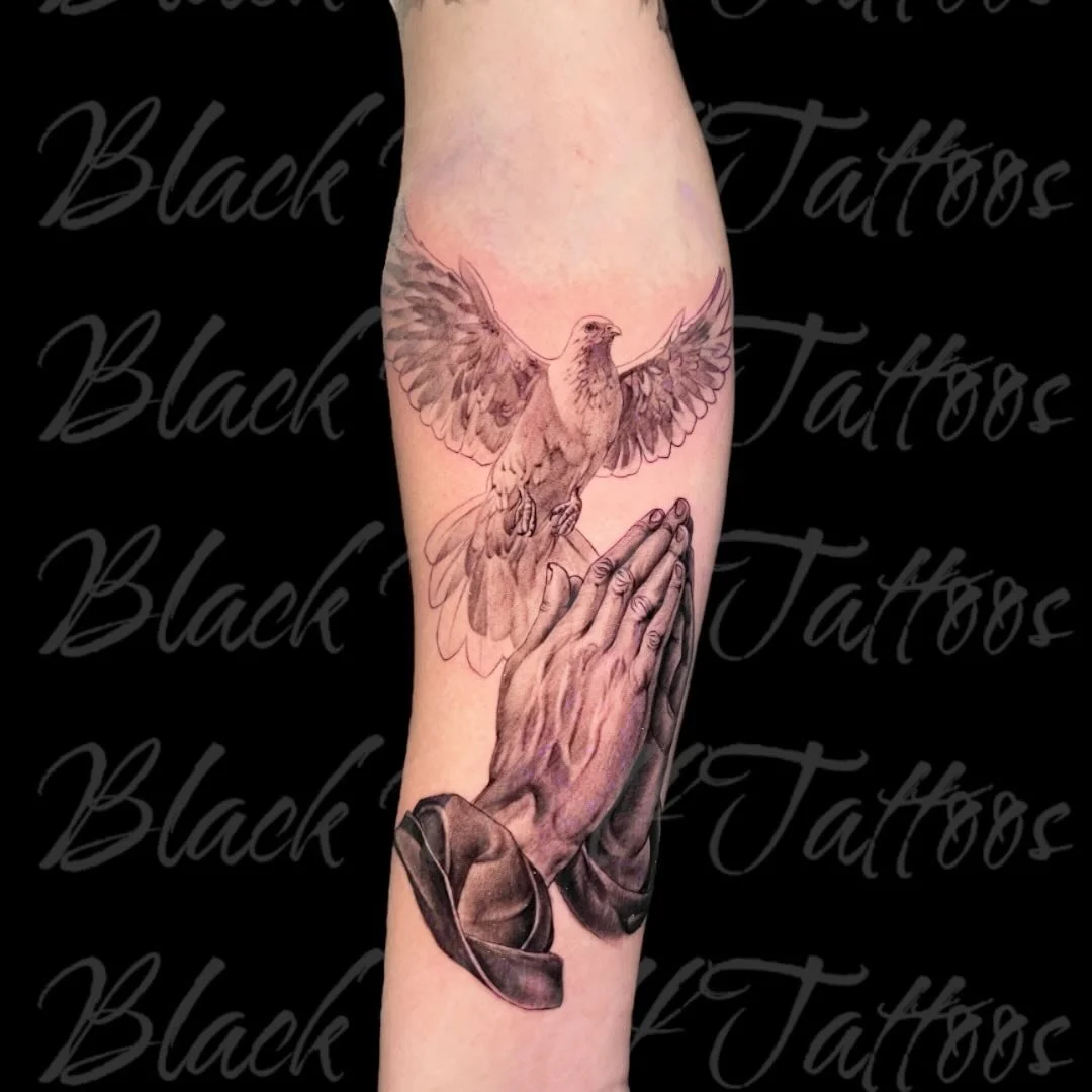 A tattoo with meaning &mdash; a black &amp; gray dove with praying hands, a symbol of peace, faith, and hope. Proud to bring this vision to life! #TattooArt #BlackAndGrayTattoo #MeaningfulInk #TattooArtist
