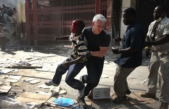 harvey-swick:

flowers-without-reason:

caesoxfan04:

Anderson Cooper saving a boy in Haiti during a shooting. A slab of concrete was dropped of the boys head.

Anderson fucking Cooper, everyone. 
Some journalists like to be strictly observers. they…