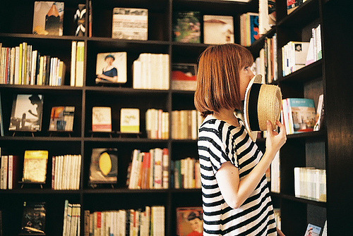 I need a library in that large, empty room of mine back home. 