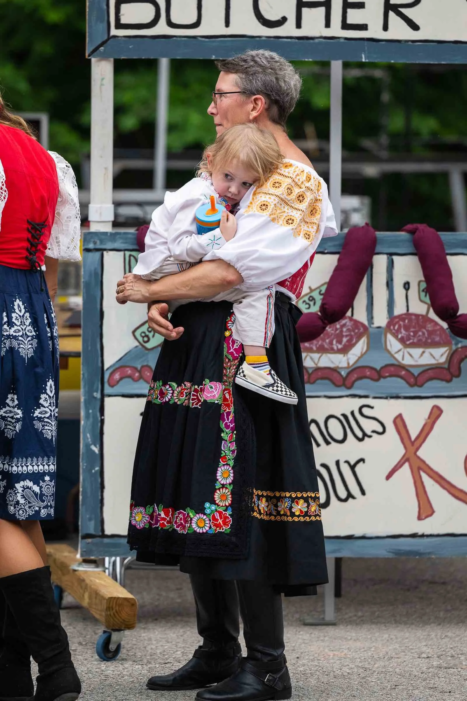 Slavic Fest 2024 Grandma Child Resting lr.jpg