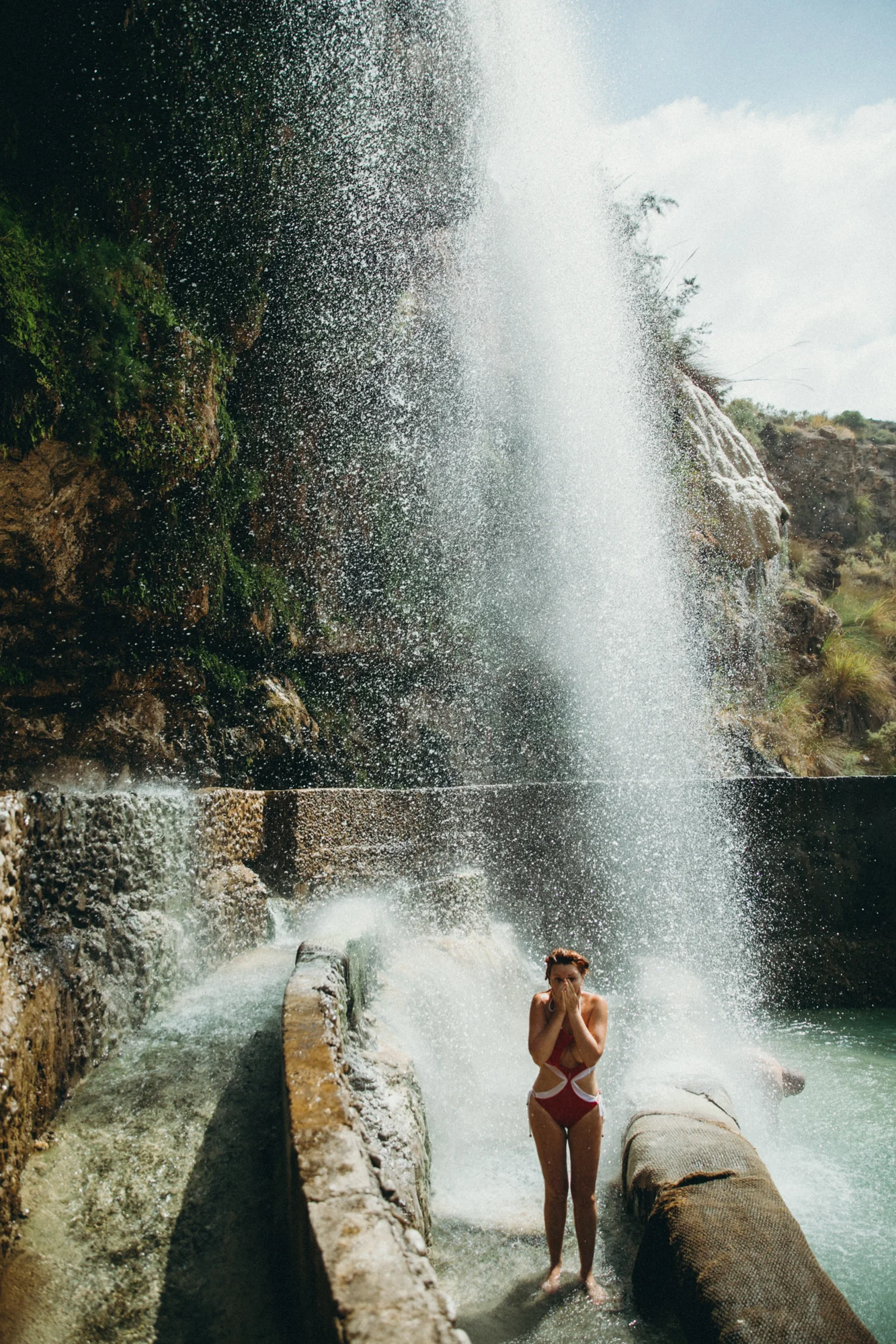 The waterfall feels like an outdoor shower. It was magical under the desert stars!